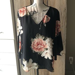 Black blouse with floral detail